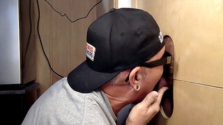 check out this hung guy getting serviced at the gloryhole