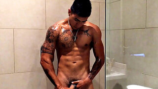 Our featured solo boy of the week is Erick, a muscular inked young Latino who invites us to watch him jerk off in the shower.
