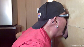 gay man sucks cock at the gloryhole
